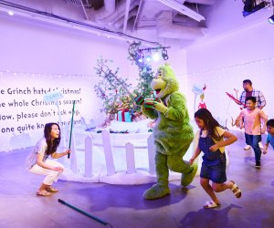Don't let The Grinch steal your presents at the Dr. Seuss Experience! Photo courtesy of Fever
