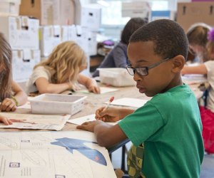 picture of a little boy at school, his parents need the Chicago public schools calendar