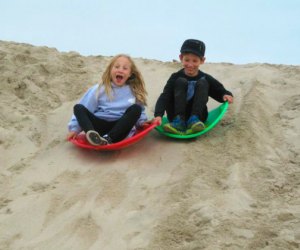 Sand sledding kids at Venice Beach