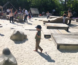 Sandbox Village at Brooklyn Bridge Park's Pier 6 is a sand city with playhouses and and a water spray area. Photo by Diana Kim