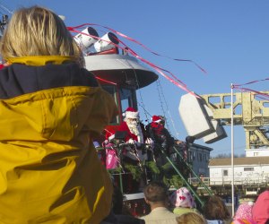 You'll know Christmas is coming when Santa arrives by tugboat in Mystic! Photo by Ben And Sam via Flickr 2.0