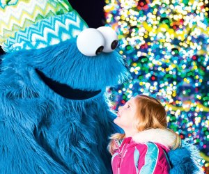 Share a cookie with the Cookie Monster at a Very Furry Christmas at Sesame Place. Photo courtesy of Sesame Place