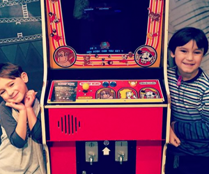 Show your kids some old-school joystick fun at the Long Island Retro Gaming Expo. Photo by the author