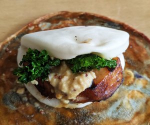 Shuya Cafe de Ramen's take on a classic bao bun features an extra-thick slice of glazed pork belly. 