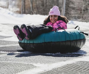 Snow tubers hurtle from top to bottom at exhilarating speeds at Shawnee Mountain Ski Area