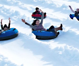 Things to Do in Atlanta This Weekend With Kids: Snow Fun, Science, Schoolhouse Rock Thrill to fun in the snow at Snow Island in Roswell. Photo courtesy of Lanier Islands