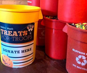 containers filled with candy for Halloween candy donations