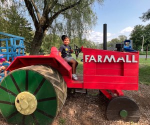 Image of child on tractor at Silverman's Farm.