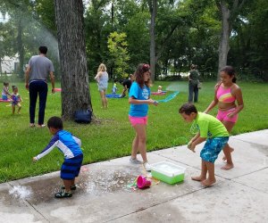 Free Things to Do With Houston Kids in September Kids can indulge in a day of water play running through sprinklers during Sprinkler Day. Photo courtesy of Nature Discovery Center.