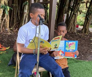 The only thing better than reading a story together is doing it together outdoors. Photo from a Story Time in the Children’s Garden at Flamingo Gardens