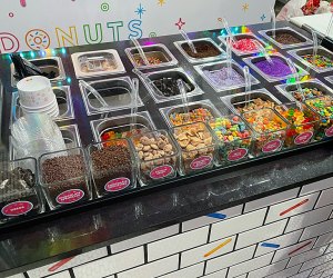An epic toppings bar allows for an endless combination of sugar-filled treats at Sundae Donuts, Huntington's newest sweet shop. 