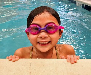 At AquaBeba, swimming lessons are designed by a former Olympian to get kids comfortable in the water and keep them safe. Photo courtesy of AquaBeba