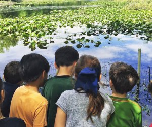 At the Tenafly Nature Center, campers explore the woods and trails, make crafts, share stories, and play games while learning about the environment. Photo courtesy of the center