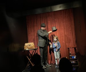 The Brooklyn Magic Shop invites kids on stage during Apolino's magic show