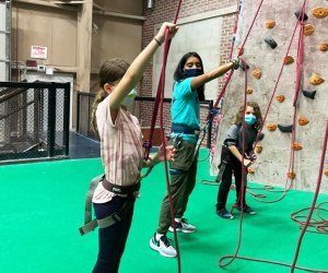 The Cliffs at Valhalla kids learn to rock climb with teacher Top Indoor Play Spaces for Kids in Westchester That Are Open Now