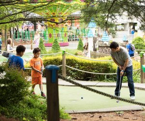 Enjoy some quality family time at the Castle Fun Center's mini-golf course.