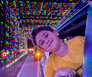 Photo of child at light display - What's open on Christmas Day in CT