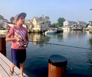 kids fishing off a pier