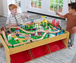 The KidKraft Wooden Train Set & Table is hours of creative fun that grows with your kids.