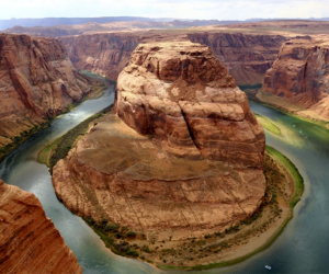 Take in the jaw-dropping geological views from Horseshoe Bend in Glen Canyon National Recreation Area. Photo courtesy of Canva