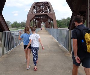Family walks across the Clinton Bridge: Little Rock with Kids: