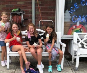 Kids enjoy ice cream cones in front of Verona's The Towne Scoope shop