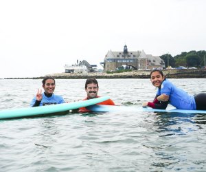 Image of surfers in the water - Things to do in Narragansett.
