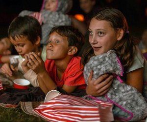 Kids enjoying movies. Photo courtesy of Canva