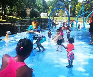 Cool down at the free Watsessing Park Spray Park in East Orange. Photo by Margaret Hargrove
