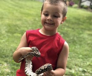 Two by Two Animal Haven animal birthday party boy with snake
