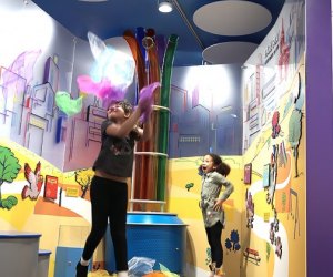 Girls play indoors at CMOM's Superpowered Metropolis