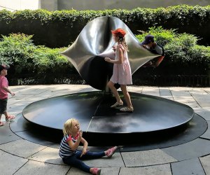 Pondering art and gravity at the Rose Center for Earth and Space. Photo by Winston Johnson