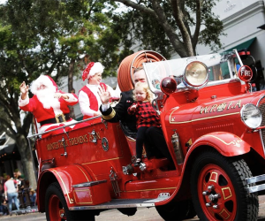 Santa rides through town at the Winter Park Parade! Photo courtesy of Visit Orlando