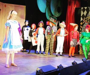Little minds get curiouser and curiouser as they explore on stage. Photo courtesy Youth Academy of Dramatic Arts