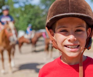 Horseback riding is a favorite kid activity in Conroe