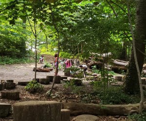 Children play at the Zucker Natural Exploration Area