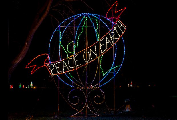 Image of a Peace on Earth Christmas light display in New England