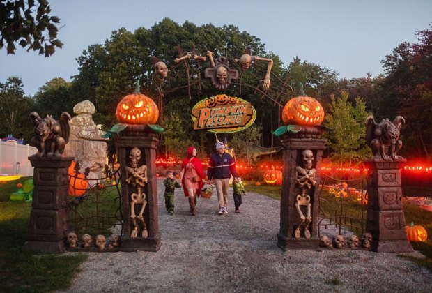 Image of a family at Nature Art Village's Pumpkin Passage.