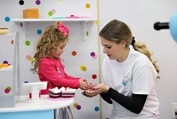 A Latte Fun, Long Island's New Play Space and Cafe: It's Fun for Everyone Have a slice of cake in the kitchen at A latte Fun. Photo by Russ Miskiewicz