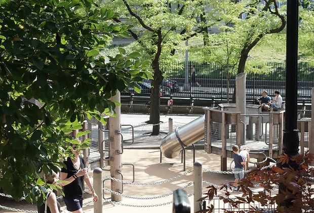 View of Ancient Playground through the foliage in Central Park