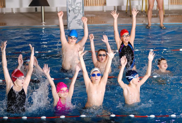 Swimming Lessons in Atlanta for Kids and Babies Students at Aquatic Consultants of Georgia can advance to the school's swim team.