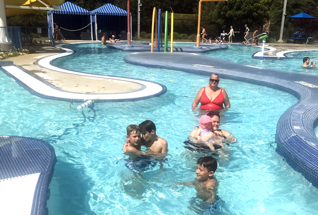 Best Swimming Pools in Atlanta: : kids and adults swim in a lazy river pool area: Cherokee County Aquatic Center 