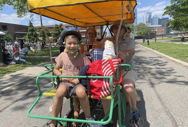 Things to do in NYC this summer: Families ride a surrey on Governors Island