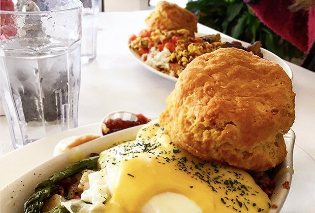 Dig into towering biscuits during your Mother's Day brunch at The Buttered Biscuit Cafe