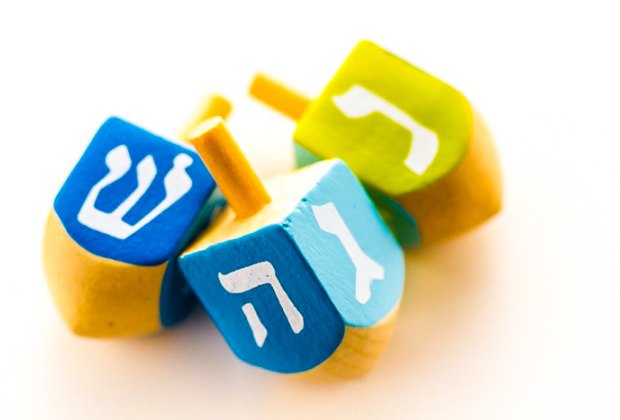 A view of each side of a dreidel, hanukah fun, family games