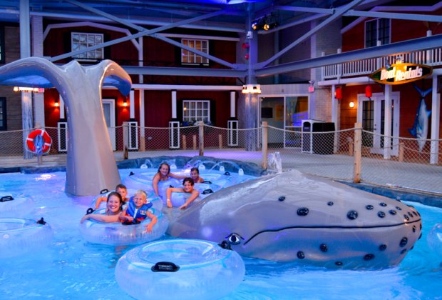 Photo of family playing at indoor waterpark in New England.