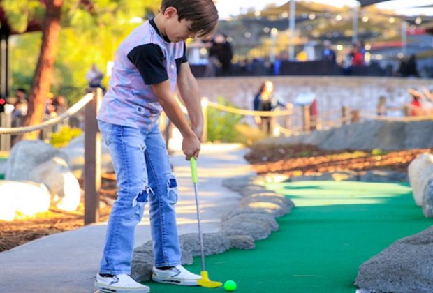 Take the kids for a round of mini golf. Order pizza at the end, and it's a party! 