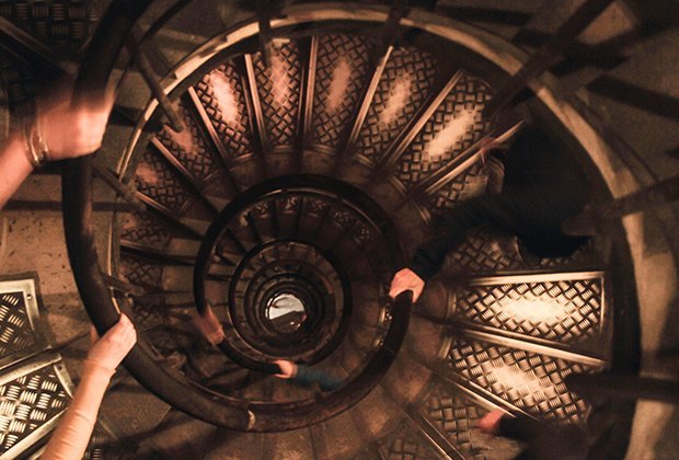 Paris Family Travel Guide Have the kids take the stairs up the Eiffel Tower for a new view on Paris. Photo by Richard Ley via Flickr.