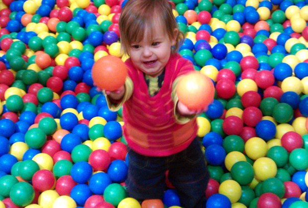 kid in ball pit