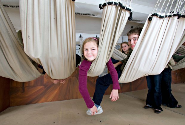 Photo of child in hammock on USS Constitution Museum.